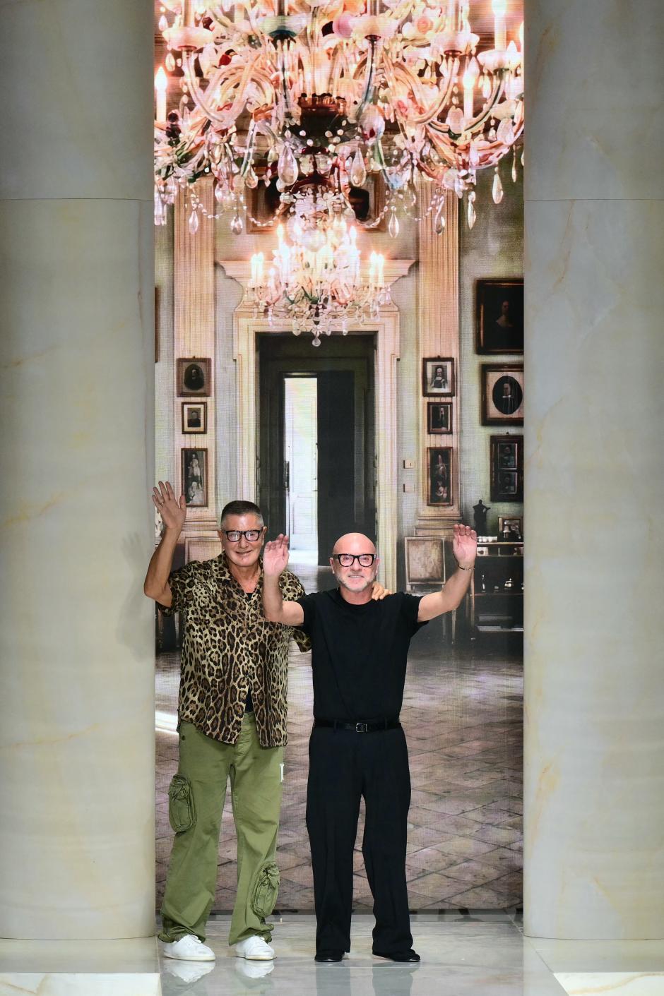 Italian designer Stefano Gabbana and Italian fashion designer Domenico Dolce greet the audience at the end of the Dolce & Gabbana collection show as part of Women's Spring/Summer 2027 Milan's fashion week, on September 26, 2026. (Photo by Stefano RELLANDINI / AFP) / ----IMAGE RESTRICTED TO EDITORIAL USE - STRICTLY NO COMMERCIAL USE-----