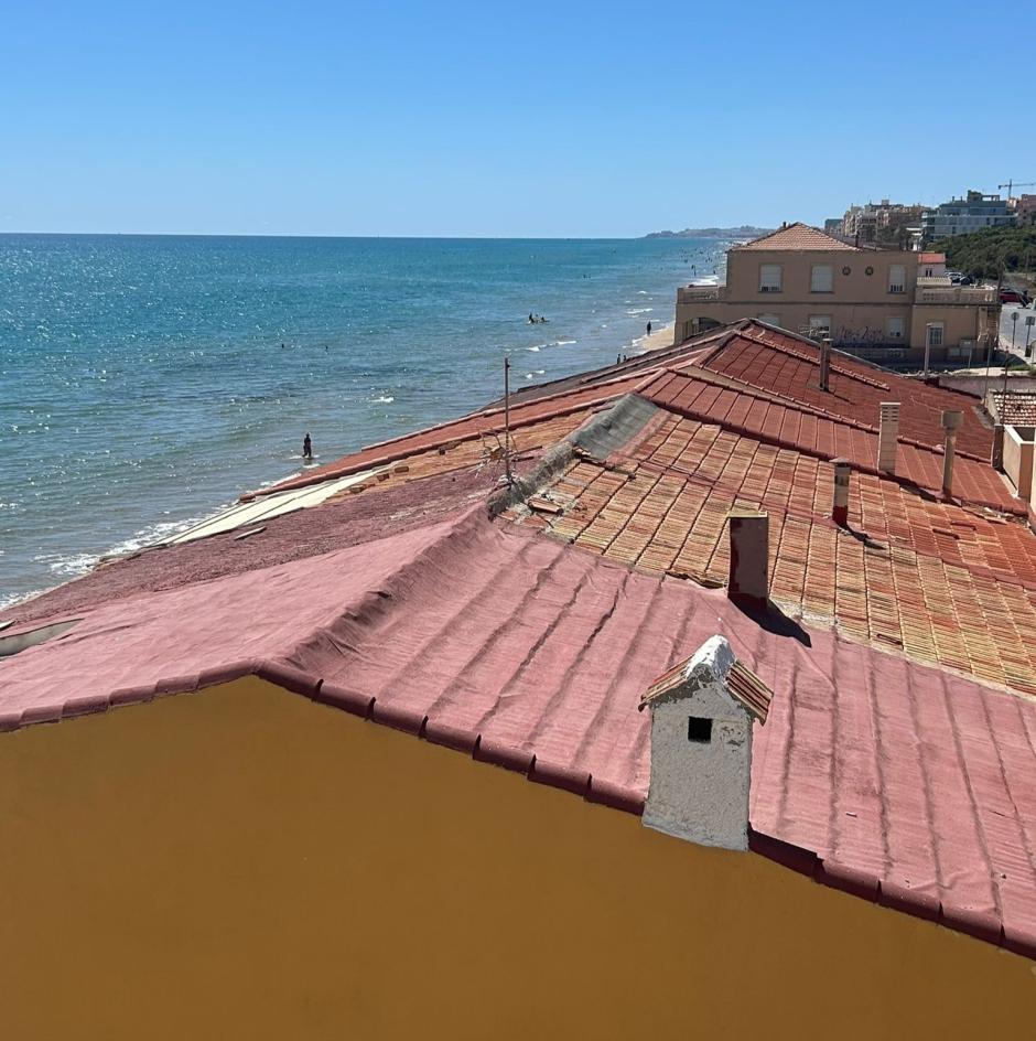 (Imagen de archivo de algunas casas en la playa de Guardamar del Segura