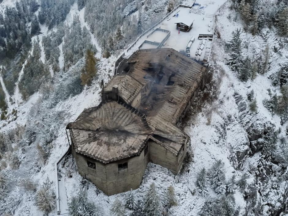 This Handout aerial photo made available by the Bavarian Police on October 24, 2026 shows the burnt mountain guesthouse Kehlsteinhaus, known as the Eagle's Nest, formerly Adolf Hitler's mountain retreat, after a large fire had broken out at the site located at an altitude of 1,834 metres (6,000 feet) in the mountains over Berchtesgaden, in the southern German state of Bavaria. Emergency services arrived on site on late October 23, 2026 and found a large fire. German police said on October 24, 2026 they have detained a suspect following a fire at Adolf Hitler's mountain retreat, known as the Eagle's Nest. (Photo by BAVARIAN POLICE / AFP) / RESTRICTED TO EDITORIAL USE - MANDATORY CREDIT "AFP PHOTO / BAVARIAN POLICE " - HANDOUT - NO MARKETING NO ADVERTISING CAMPAIGNS - DISTRIBUTED AS A SERVICE TO CLIENTS