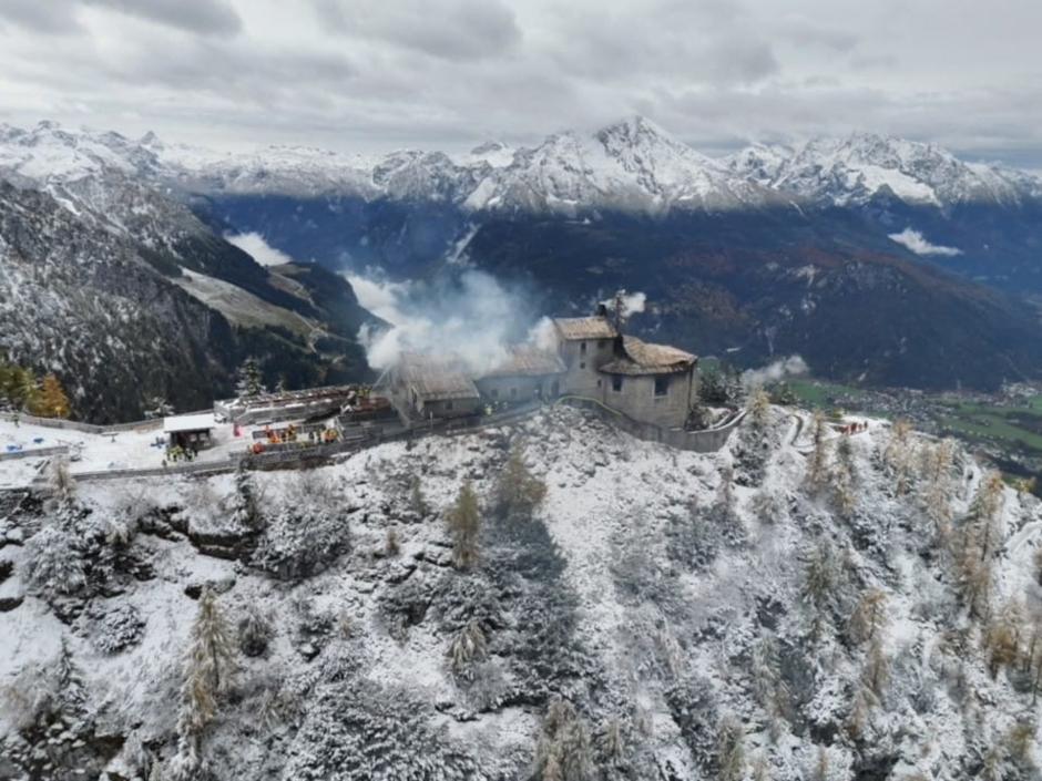 This Handout aerial photo made available by the Bavarian Police on October 24, 2026 shows the burnt mountain guesthouse Kehlsteinhaus, known as the Eagle's Nest, formerly Adolf Hitler's mountain retreat, after a large fire had broken out at the site located at an altitude of 1,834 metres (6,000 feet) in the mountains over Berchtesgaden, in the southern German state of Bavaria. Emergency services arrived on site on late October 23, 2026 and found a large fire. German police said on October 24, 2026 they have detained a suspect following a fire at Adolf Hitler's mountain retreat, known as the Eagle's Nest. (Photo by BAVARIAN POLICE / AFP) / RESTRICTED TO EDITORIAL USE - MANDATORY CREDIT "AFP PHOTO / BAVARIAN POLICE " - HANDOUT - NO MARKETING NO ADVERTISING CAMPAIGNS - DISTRIBUTED AS A SERVICE TO CLIENTS